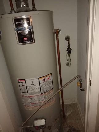 water heater overflow pipe running|How To Fix A Water Heater Leaking From The Overflow Pipe